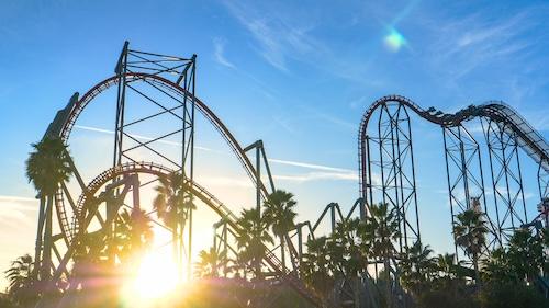 Close,Up,,Lens,Flare:,Scenic,Shot,Of,A,Rollercoaster,Ride