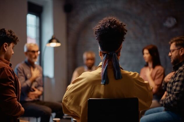 woman attending mental health therapy session at community center.